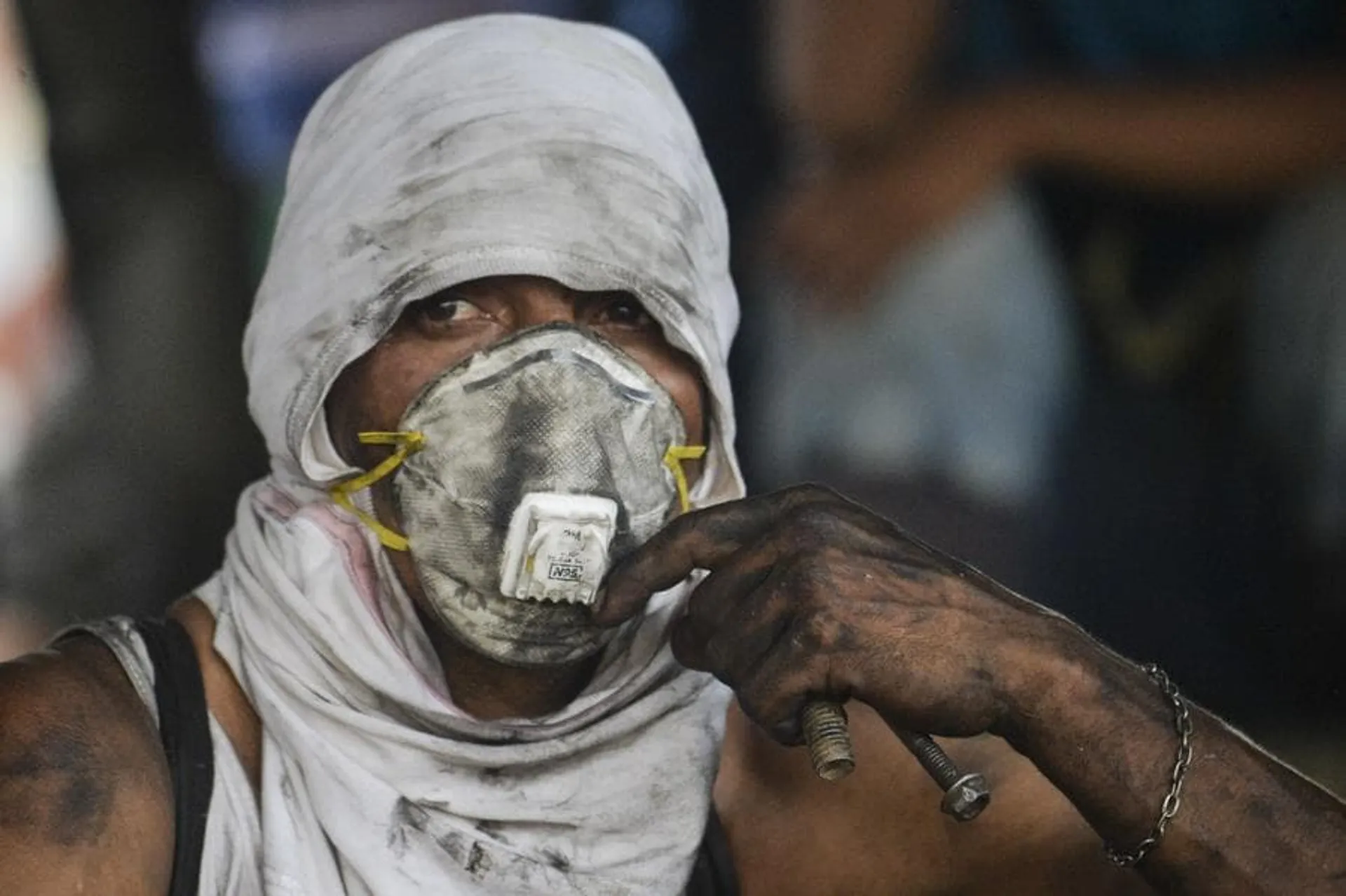 TOPSHOT - A demonstrator remains under the Simon Bolivar International Bridge in Cucuta, Colombia, on the border with Venezuela, on February 25, 2019. - United States Vice President Mike Pence told Venezuelan opposition leader Juan Guaido that Donald Trump supports him "100 percent" as the pair met regional allies on Monday to thrash out a strategy to remove Nicolas Maduro from power after the failed attempt to ship in humanitarian aid. (Photo by Luis ROBAYO / AFP)        (Photo credit should read LUIS ROBAYO/AFP/Getty Images)